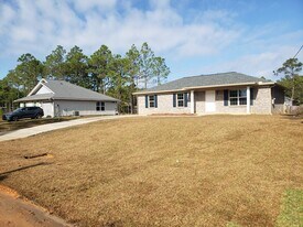 5666 United Ct in Gulf Breeze, FL - Building Photo