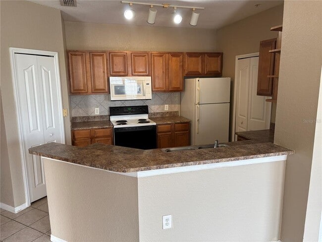 6177 Metrowest Blvd in Orlando, FL - Building Photo - Building Photo