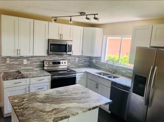 7243 Coppitt Key St in Greenacres, FL - Building Photo - Building Photo