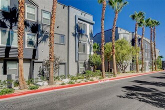 9050 W Tropicana Ave in Las Vegas, NV - Building Photo - Building Photo