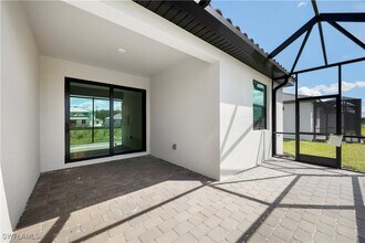 19597 Hinkley Dr in Estero, FL - Building Photo - Building Photo