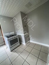 1561 Holmes St in Saginaw, MI - Building Photo - Building Photo