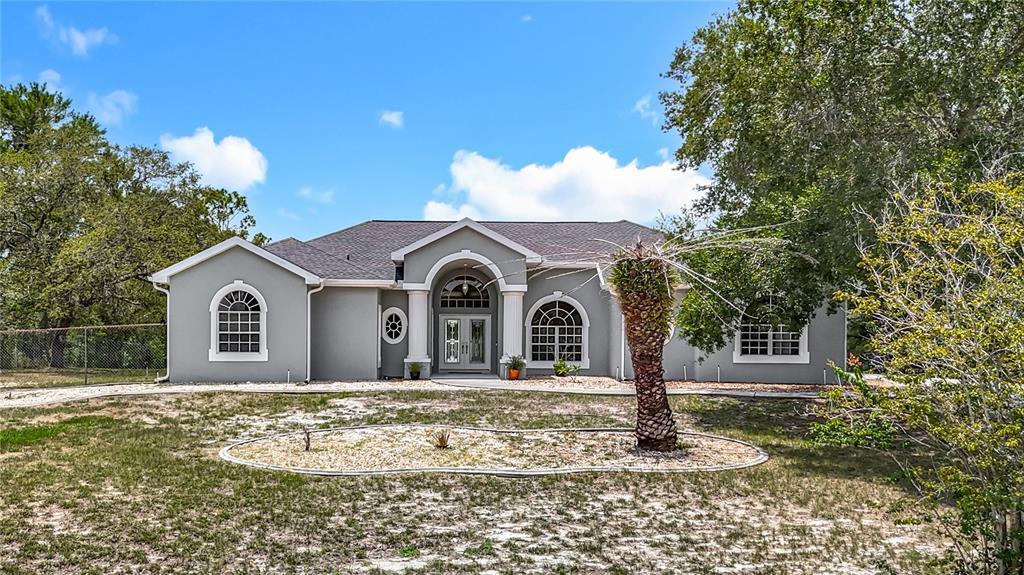 8303 NIGHTWALKER Rd in Weeki Wachee, FL - Building Photo