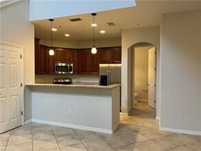 8989 Cambria Cir-Unit -1804 in Naples, FL - Building Photo - Building Photo