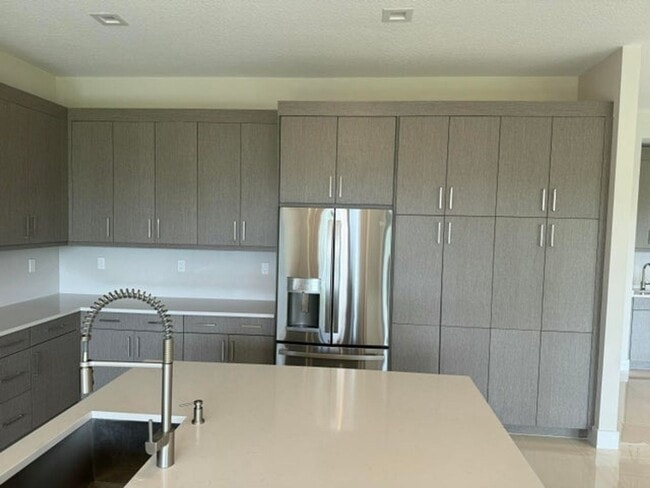 10033 Stockrun Dr in Palm Beach Gardens, FL - Building Photo - Building Photo