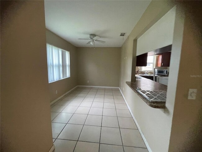 9909 Sweepstakes Ln, Unit GE in Orlando, FL - Building Photo - Building Photo