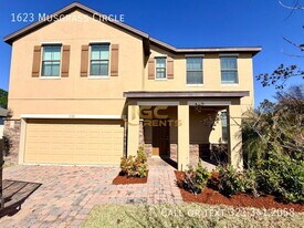 1623 Musgrass Cir in West Melbourne, FL - Building Photo
