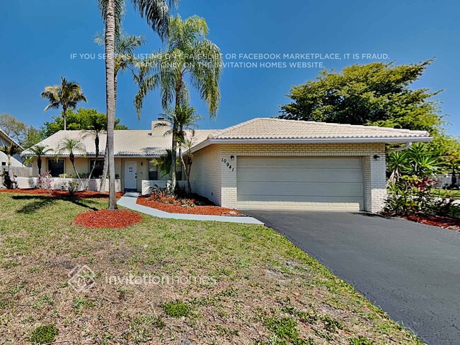 property at 10941 NW 7th St