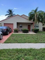 7943 Bishopwood Rd in Greenacres, FL - Building Photo