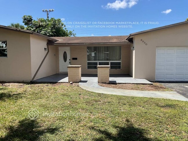 property at 8950 SW 53rd St