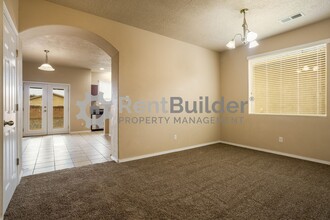 1247 Desert Paintbrush Loop in Rio Rancho, NM - Building Photo - Building Photo