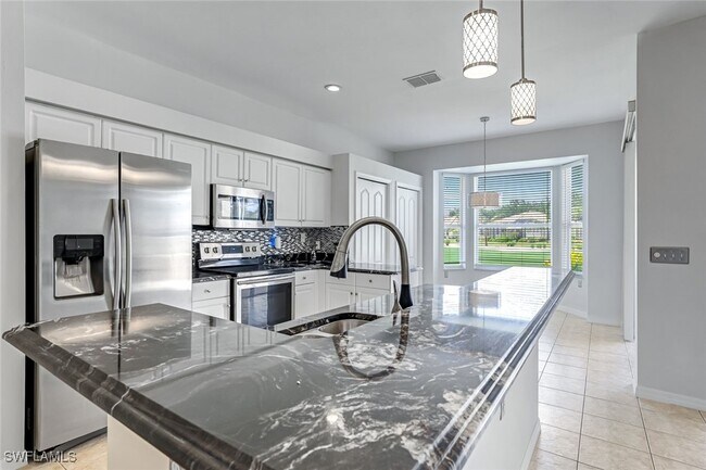 1725 Morning Sun Ln in Naples, FL - Building Photo - Building Photo