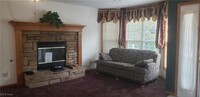 15032 Woodsong Dr in Middlefield, OH - Foto de edificio - Building Photo