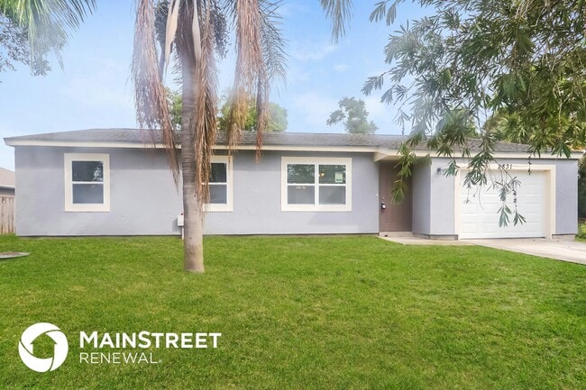 property at 2831 SE Melaleuca Blvd