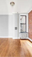 Act now on this gorgeous 2BR 1BTH apartmen in New York, NY - Building Photo - Building Photo