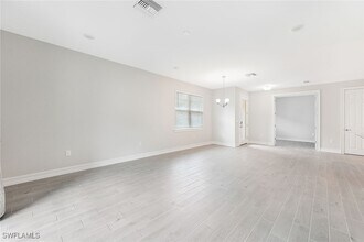 1057 Tranquil Brk Dr in Naples, FL - Building Photo - Building Photo