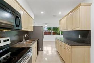 50 NE 45th Ct in Oakland Park, FL - Building Photo - Building Photo