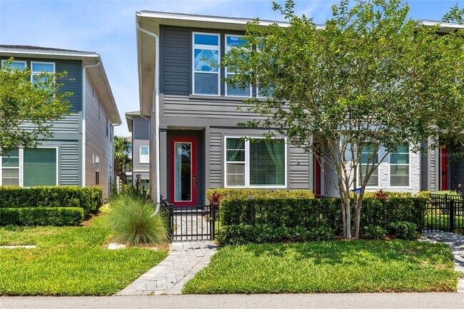 property at 8673 Tavistock Lakes Blvd