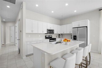 14720 Kingfisher Lp in Naples, FL - Foto de edificio - Building Photo