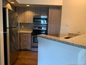 417 Vista Isles Dr-Unit -2321 in Plantation, FL - Building Photo - Building Photo