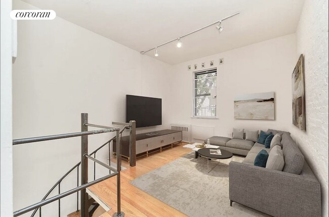 property at 233 E 12th St