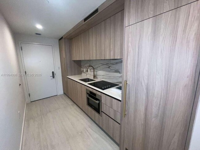 property at 77 SE 5th St