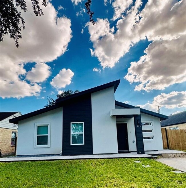 property at 905 B-C Ave