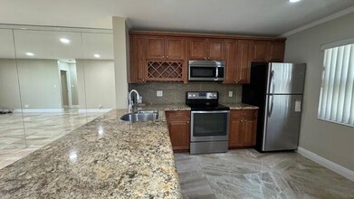 3819 Carambola Cir N-Unit -2941 in Coconut Creek, FL - Building Photo - Building Photo