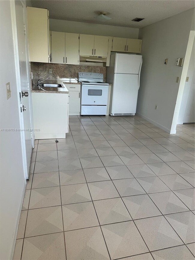 property at 120 W 9th St