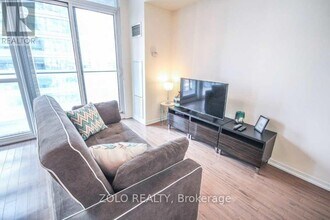 65-2065 Bremner Blvd in Toronto, ON - Building Photo - Building Photo