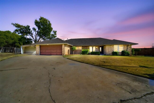 property at 308 SE Camelot Dr