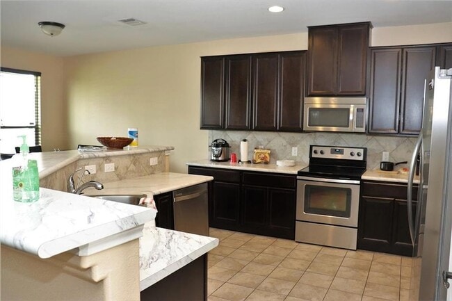 1112 Strickling Dr, Unit 1A in Austin, TX - Building Photo - Building Photo