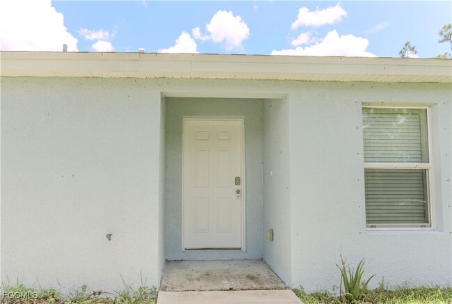 309 Norwalk Ave in Lehigh Acres, FL - Foto de edificio - Building Photo