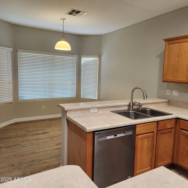 14636 W Gelding Dr in Surprise, AZ - Building Photo - Building Photo