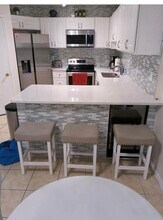 1655 The Greens Way, Unit 2411 in Jacksonville Beach, FL - Building Photo - Building Photo