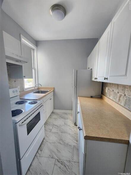 36 Hillside Ave., Unit 1 in Williston Park, NY - Building Photo