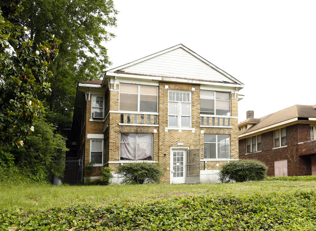 1447 Poplar Ave in Memphis, TN - Foto de edificio - Building Photo