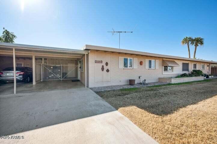 10731 W Abbott Ave in Sun City, AZ - Building Photo