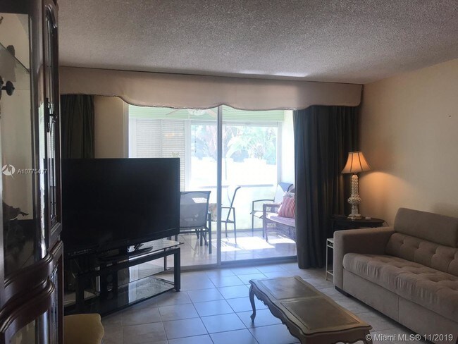 1001 NE 14th Ave-Unit -103 in Hallandale Beach, FL - Building Photo - Building Photo