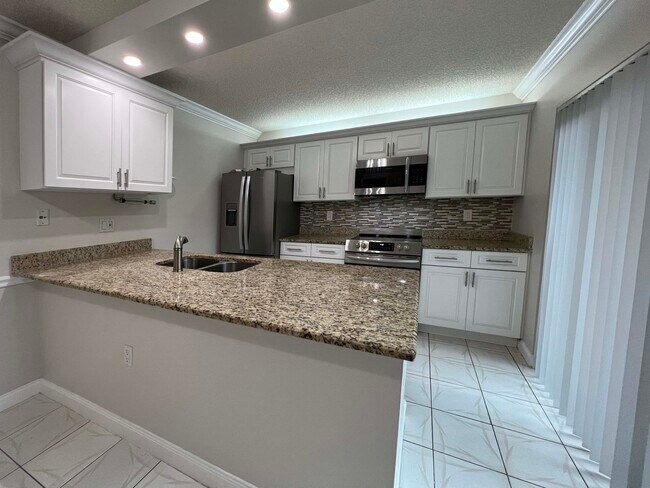 7407 74th Way in West Palm Beach, FL - Building Photo - Building Photo