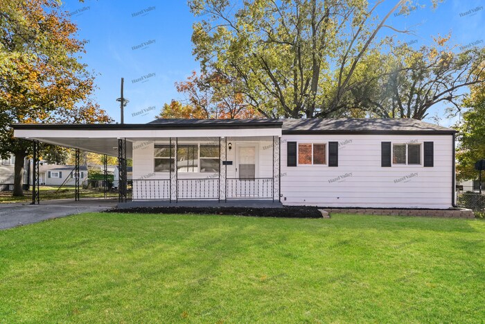 1100 Ozment Dr in Florissant, MO - Foto de edificio