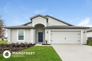 1661 Hideaway Flat St in Mascotte, FL - Building Photo