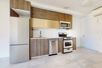 West 122nd Street in New York, NY - Building Photo - Building Photo