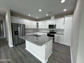 9022 Parrot Pl in Panama City Beach, FL - Building Photo - Building Photo