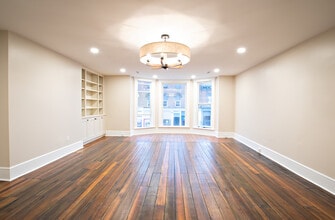 100 W Main St, Unit Apartment 1 in Cambridge City, IN - Building Photo - Building Photo