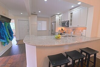 7778 Emerald Cir in Naples, FL - Foto de edificio - Building Photo