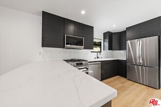12257 Collins St in Los Angeles, CA - Building Photo - Building Photo