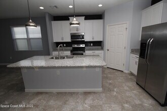 884 Musgrass Cir in West Melbourne, FL - Building Photo - Building Photo
