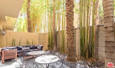 411 N Oakhurst Dr in Beverly Hills, CA - Building Photo - Building Photo