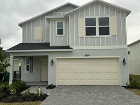 5892 NW Sweetwood Dr in Port St. Lucie, FL - Building Photo